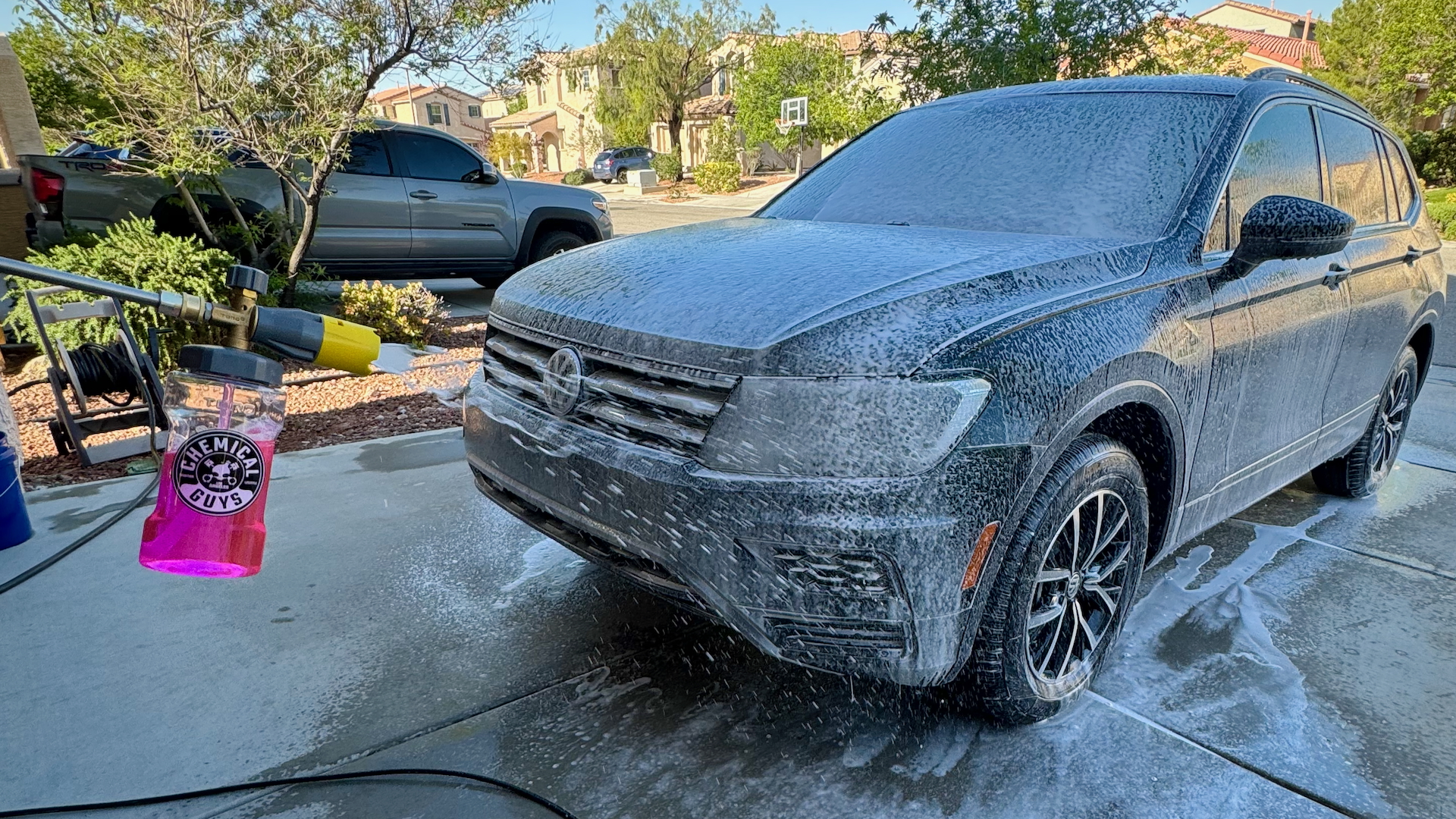 DeWalt electric washer being used with Chemical Guys foam cannon to wash a car.