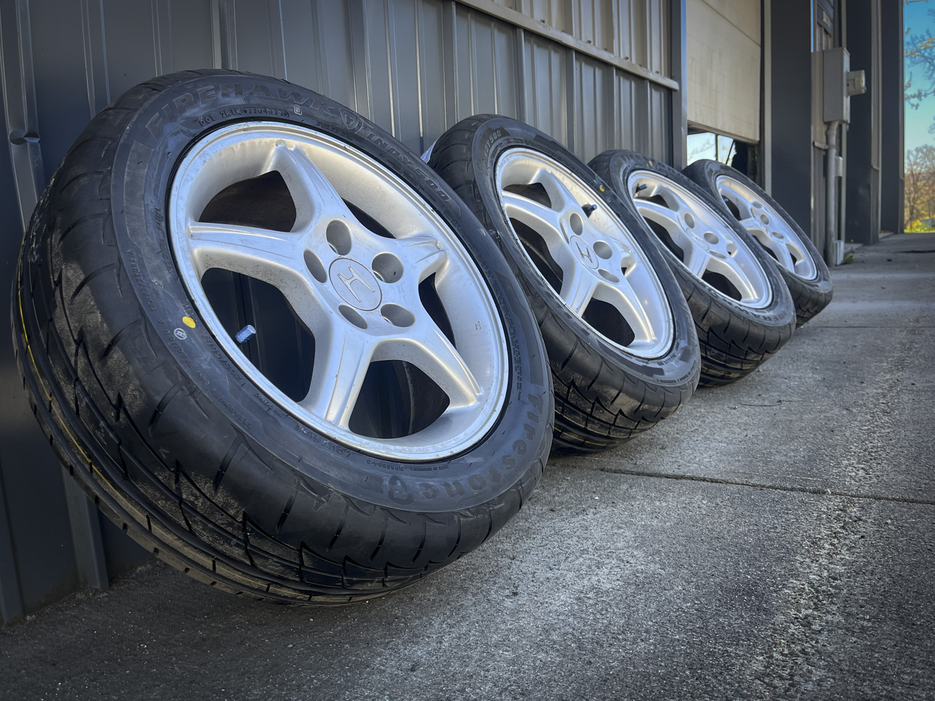 Firestone Firehawk Indy 500 Tires mounted on fifth-generation Prelude wheels, 16-inch.