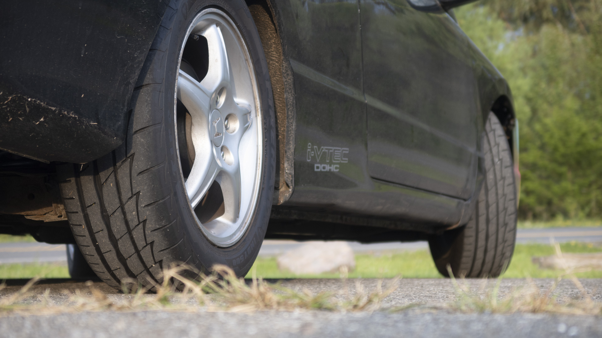 Close-up, Honda Civic rear wheel.