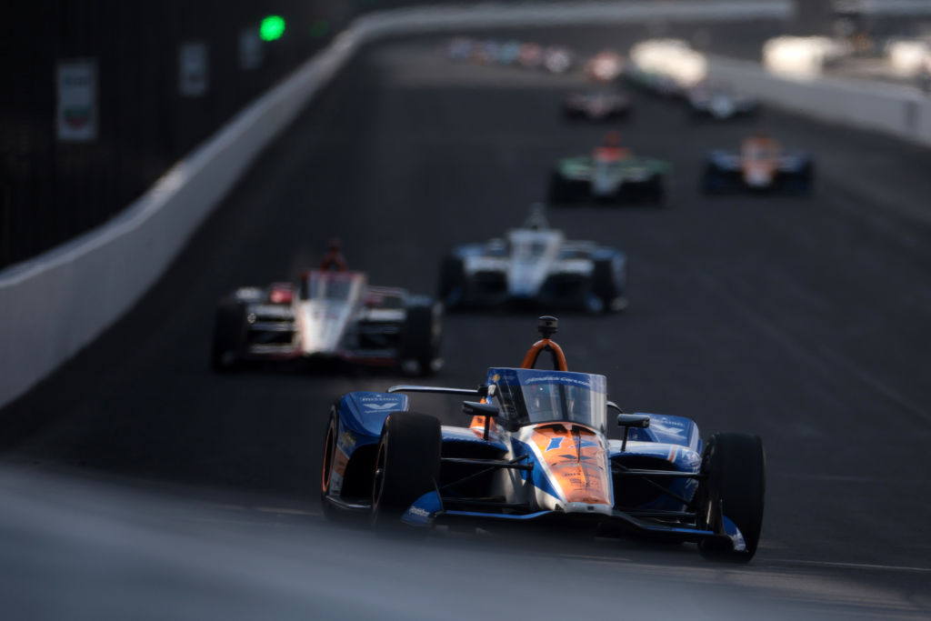 INDIANAPOLIS, INDIANA - MAY 26: Kyle Larson, driver of the #17 Hendrickcars.com Arrow McLaren, leads a pack of cars during the 108th Running of the Indianapolis 500 at Indianapolis Motor Speedway on May 26, 2024 in Indianapolis, Indiana. (Photo by James Gilbert/Getty Images)