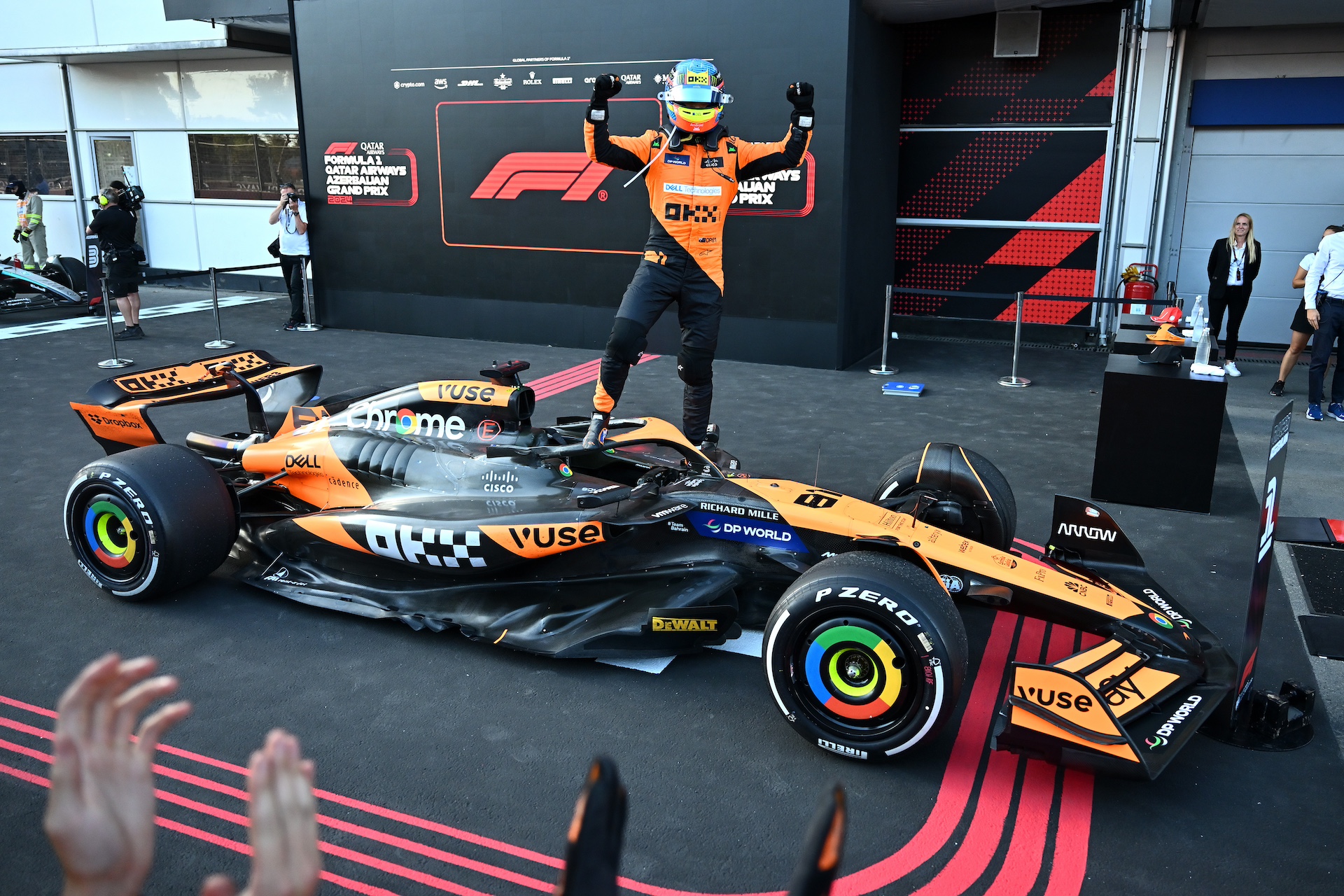 BAKU, AZERBAIJAN - SEPTEMBER 15: Race winner Oscar Piastri of Australia and McLaren celebrates in parc ferme during the F1 Grand Prix of Azerbaijan at Baku City Circuit on September 15, 2024 in Baku, Azerbaijan. (Photo by Dan Mullan/Getty Images)