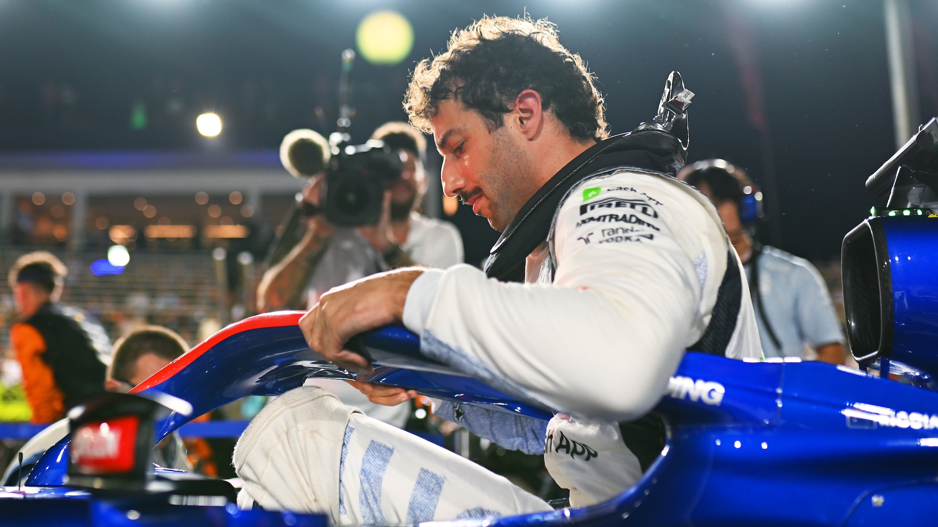 SINGAPORE, SINGAPORE - SEPTEMBER 22: Daniel Ricciardo of Australia and Visa Cash App RB on the grid prior to the F1 Grand Prix of Singapore at Marina Bay Street Circuit on September 22, 2024 in Singapore, Singapore. (Photo by Rudy Carezzevoli/Getty Images)