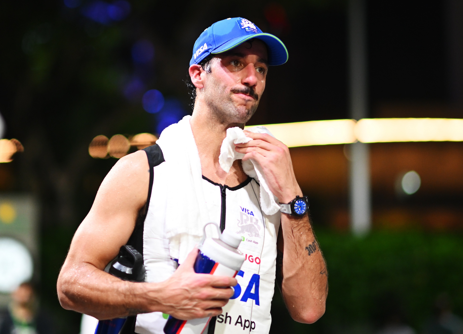 SINGAPORE, SINGAPORE - SEPTEMBER 22: 18th Placed Daniel Ricciardo of Australia and Visa Cash App RB looks on in the Paddock after the F1 Grand Prix of Singapore at Marina Bay Street Circuit on September 22, 2024 in Singapore, Singapore. (Photo by Rudy Carezzevoli/Getty Images)