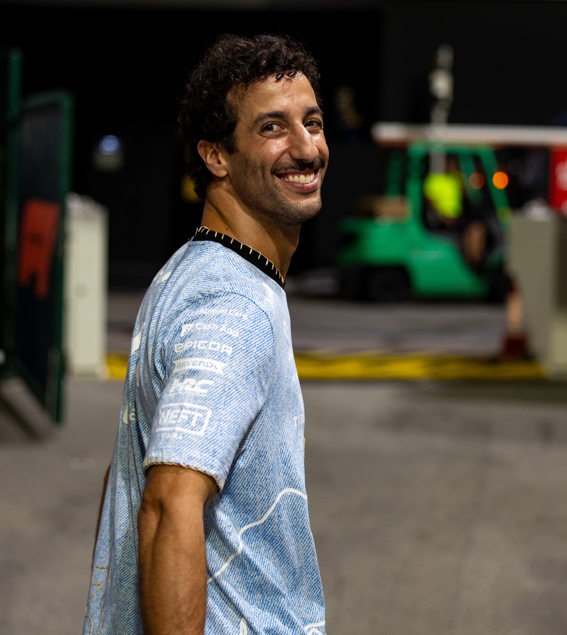 SINGAPORE, SINGAPORE - SEPTEMBER 22: Daniel Ricciardo of Australia and Visa Cash App RB F1 team leaves the paddock for what is likely to be the final time as an F1 driver after the F1 Grand Prix of Singapore at Marina Bay Street Circuit on September 22, 2024 in Singapore, Singapore. (Photo by Kym Illman/Getty Images)