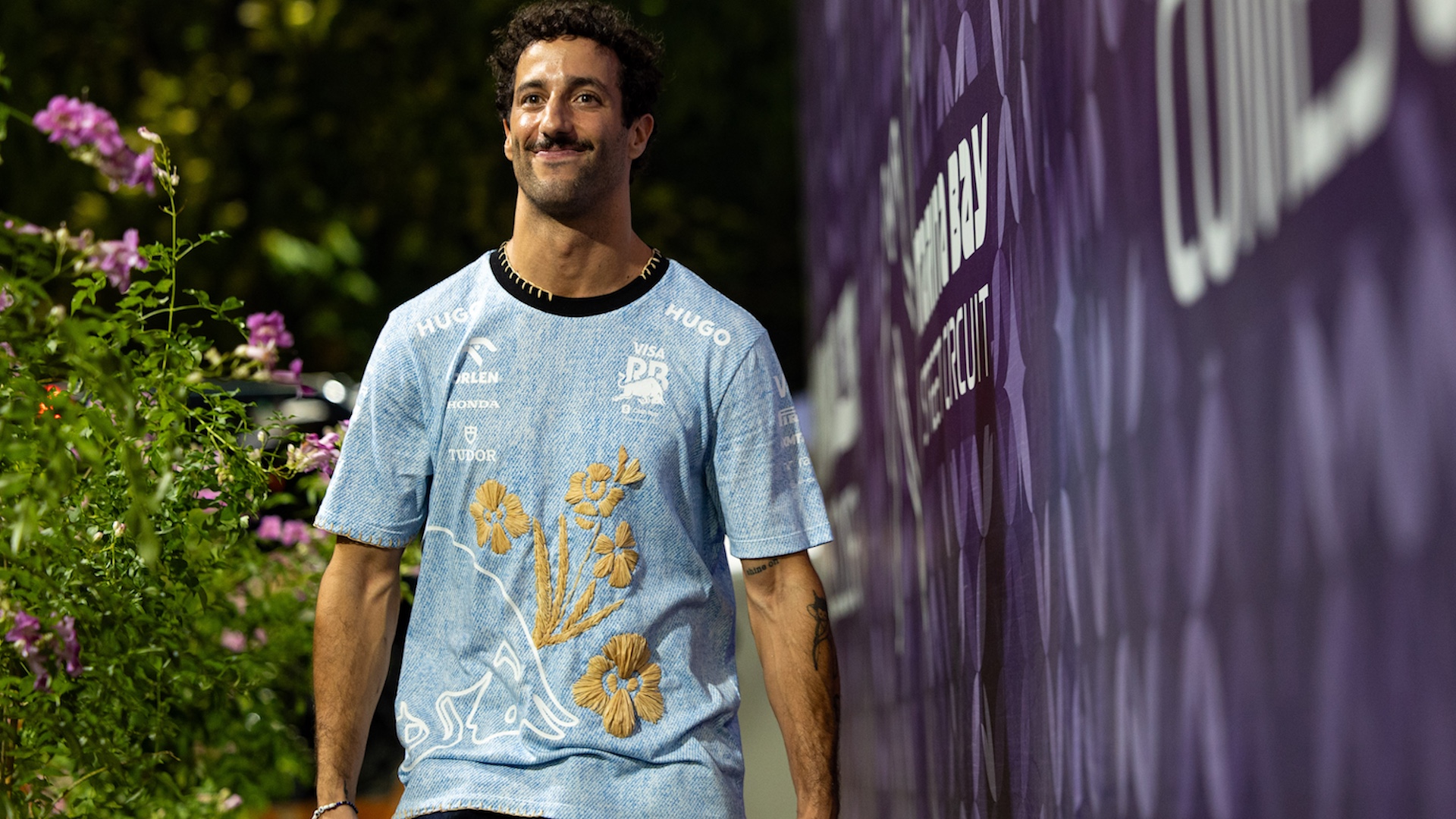 SINGAPORE, SINGAPORE - SEPTEMBER 22: Daniel Ricciardo of Australia and Visa Cash App RB F1 team leaves the paddock for what is likely to be the final time as an F1 driver after the F1 Grand Prix of Singapore at Marina Bay Street Circuit on September 22, 2024 in Singapore, Singapore. (Photo by Kym Illman/Getty Images)