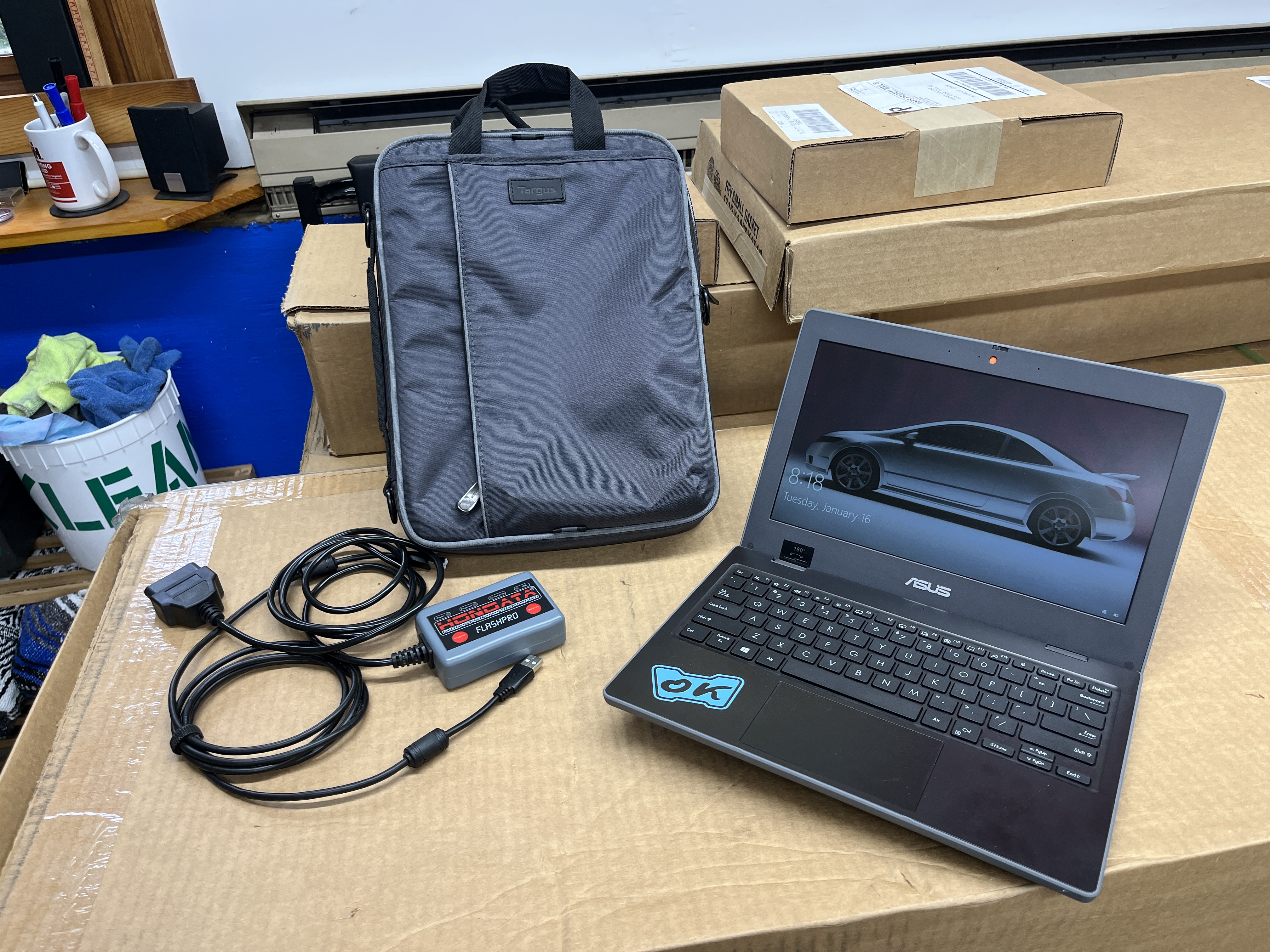 Hondata engine tuning device plus laptop computer.