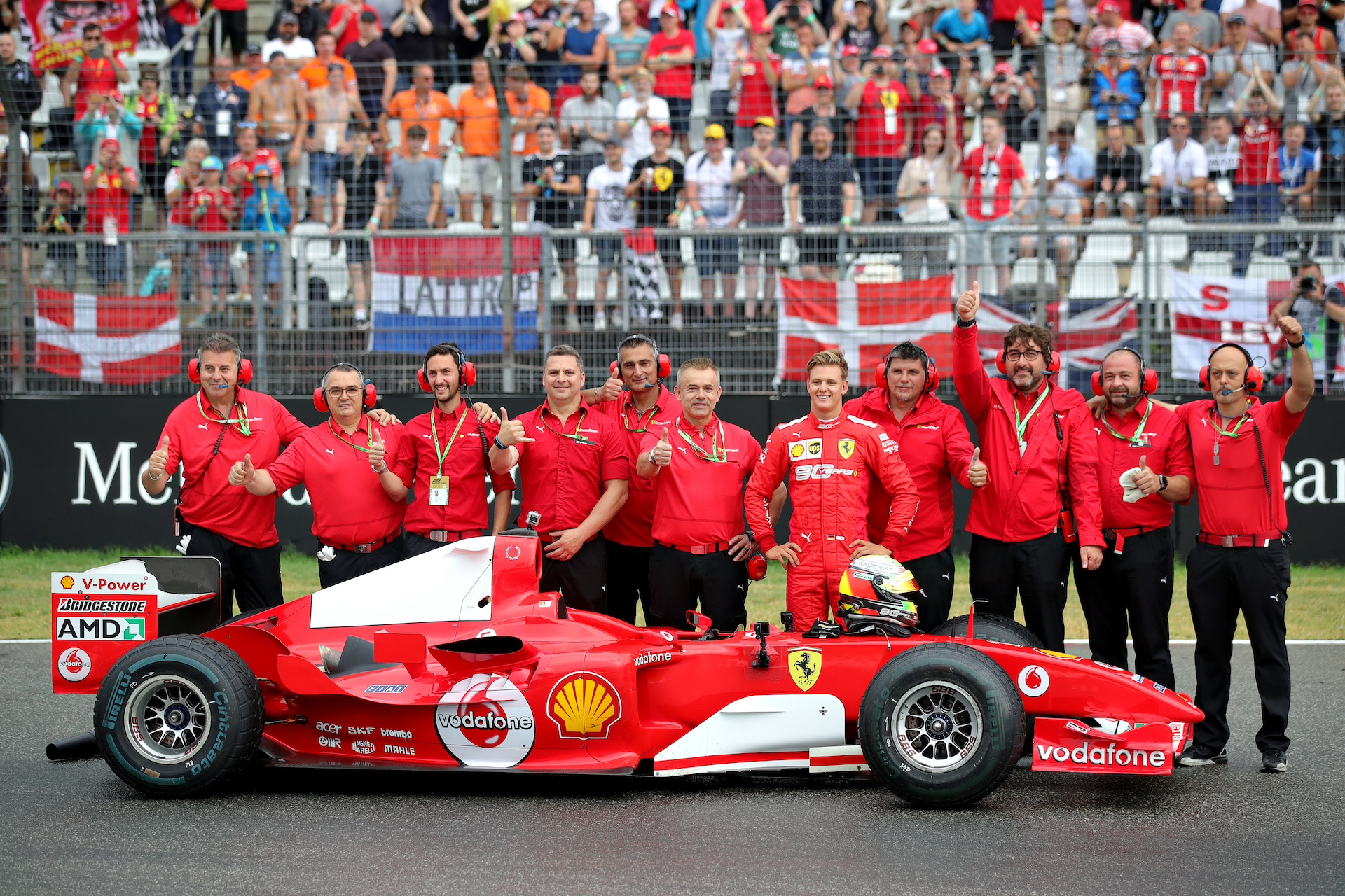 HOCKENHEIM, GERMANY - JULY 28: Mick Schumacher of Germany smiles after driving the Ferrari F2004 of his father, Michael Schumacher, before the F1 Grand Prix of Germany at Hockenheimring on July 28, 2019 in Hockenheim, Germany. (Photo by Alexander Hassenstein/Getty Images)