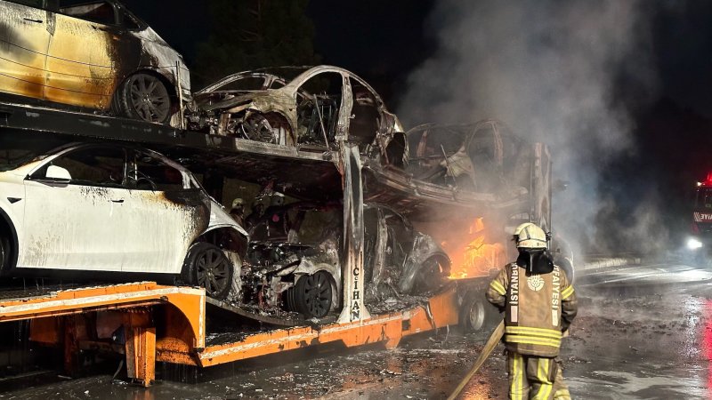 ISTANBUL, TURKIYE - OCTOBER 06: Six Tesla electric cars burn on the trailer of the moving lorry carrying them after one of them catches on fire due to unknown reasons in Istanbul, Turkiye on October 06, 2023. (Photo by Muhammed Gencebay Gur/Anadolu Agency via Getty Images)