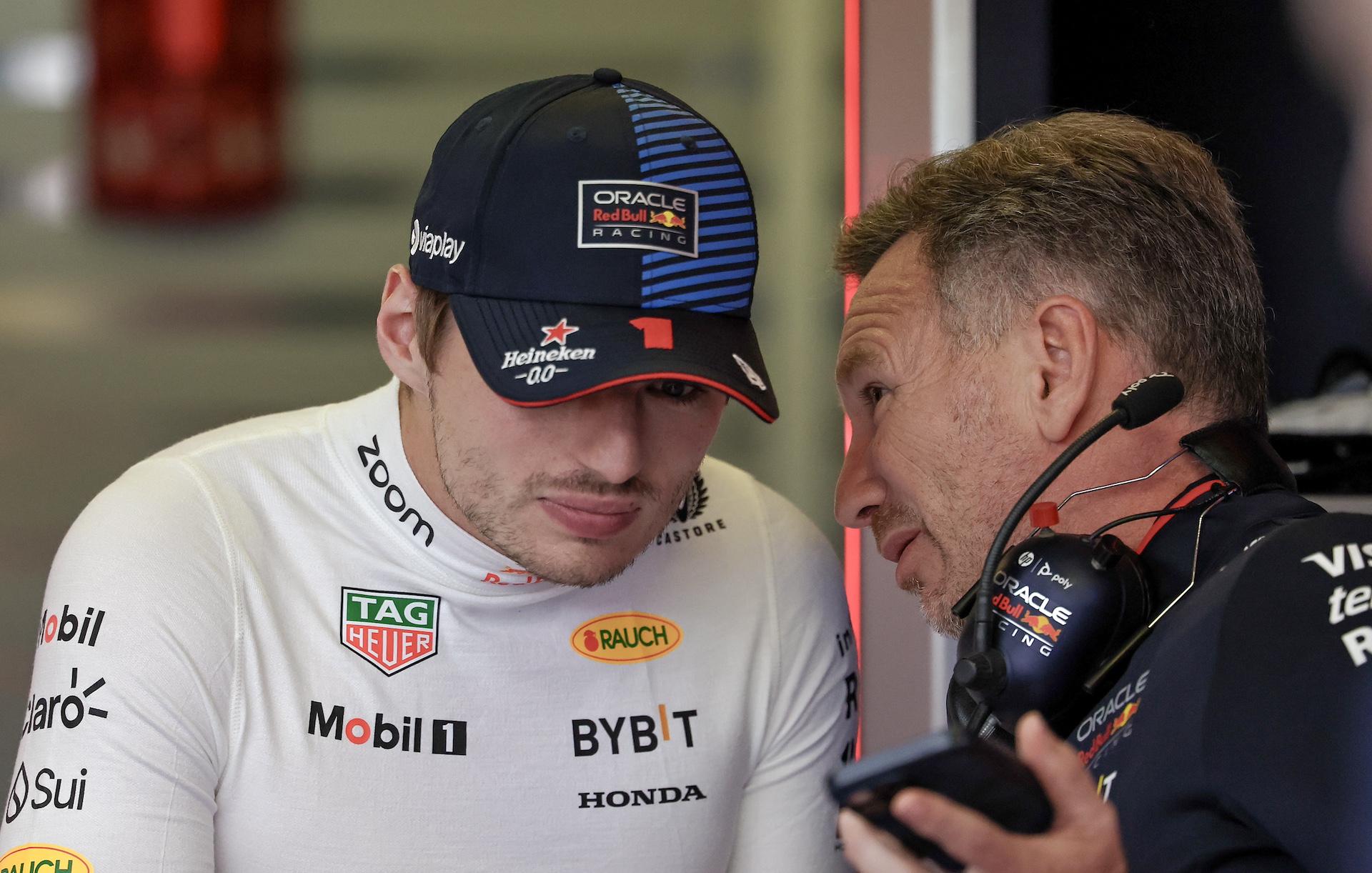 MEXICO CITY, MEXICO - OCTOBER 27: Max Verstappen of the Netherlands and Oracle Red Bull Racing and Christian Horner of Great Britain and Oracle Red Bull Racing in the garage during the F1 Grand Prix of Mexico at Autodromo Hermanos Rodriguez on October 27, 2024 in Mexico City, Mexico. (Photo by Song Haiyuan/MB Media/Getty Images)