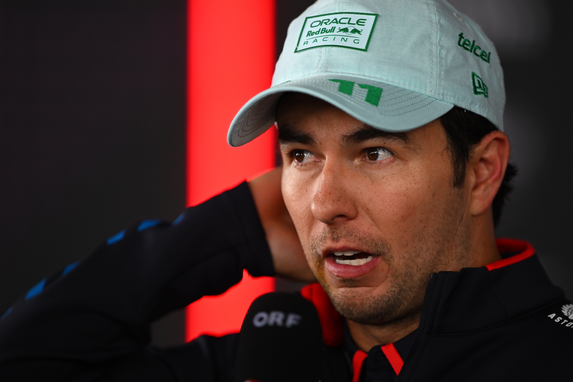 MEXICO CITY, MEXICO - OCTOBER 27: Sergio Perez of Mexico and Oracle Red Bull Racing talks to the media after the F1 Grand Prix of Mexico at Autodromo Hermanos Rodriguez on October 27, 2024 in Mexico City, Mexico. (Photo by Rudy Carezzevoli/Getty Images)