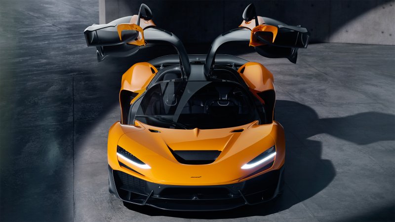 McLaren W1 with its doors up like wings.