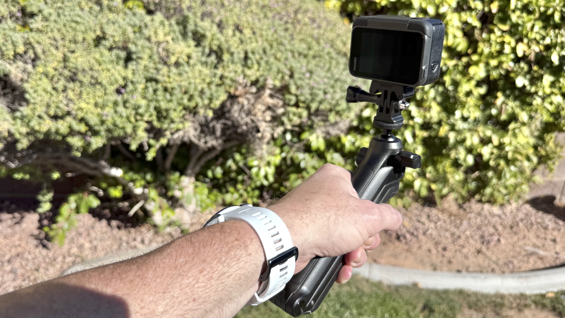 Insta360 Ace Pro on tri pod handle