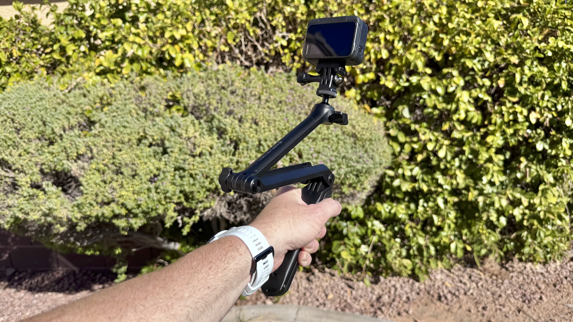 Insta360 Ace Pro on tri pod handle