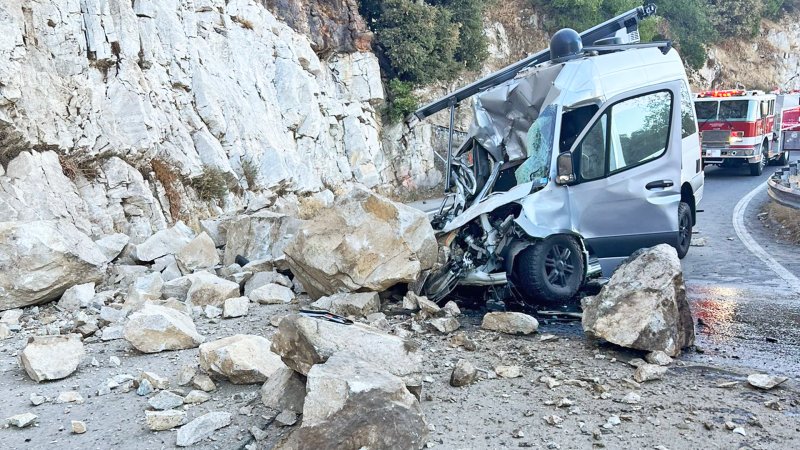 Falling Boulder Absolutely Crushes Sprinter Van on California Road