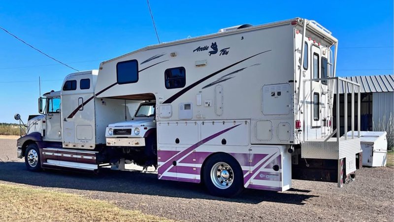 This Semi-Truck Turned RV Has a Portable Parking Spot for a Suzuki Samurai