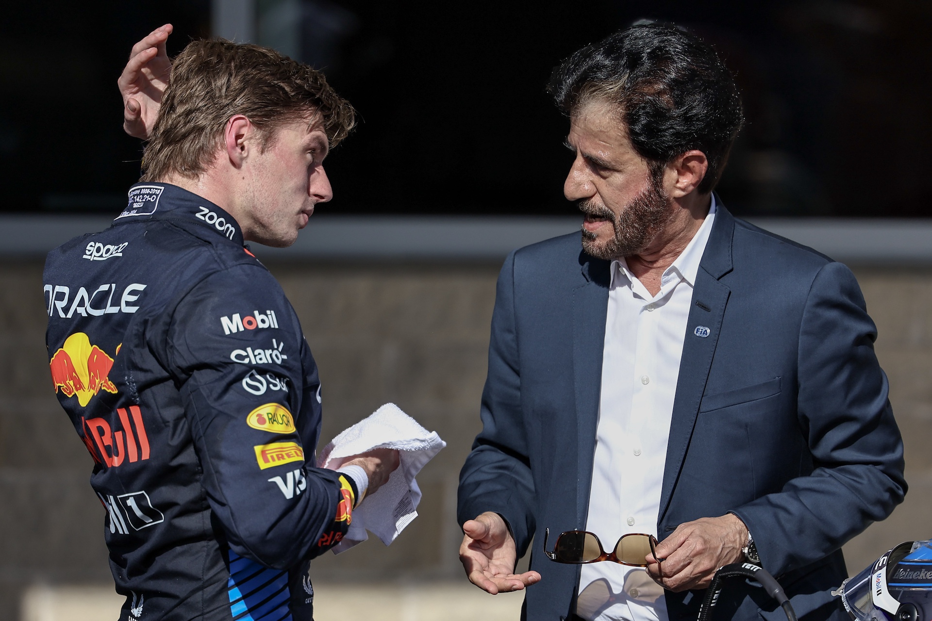 AUSTIN, TEXAS - OCTOBER 20: Max Verstappen of the Netherlands and Oracle Red Bull Racing and Mohammed Ben Sulayem of UAE and FIA President in parc feme during the F1 Grand Prix of United States at Circuit of The Americas on October 20, 2024 in Austin, United States. (Photo by Song Haiyuan/MB Media/Getty Images)