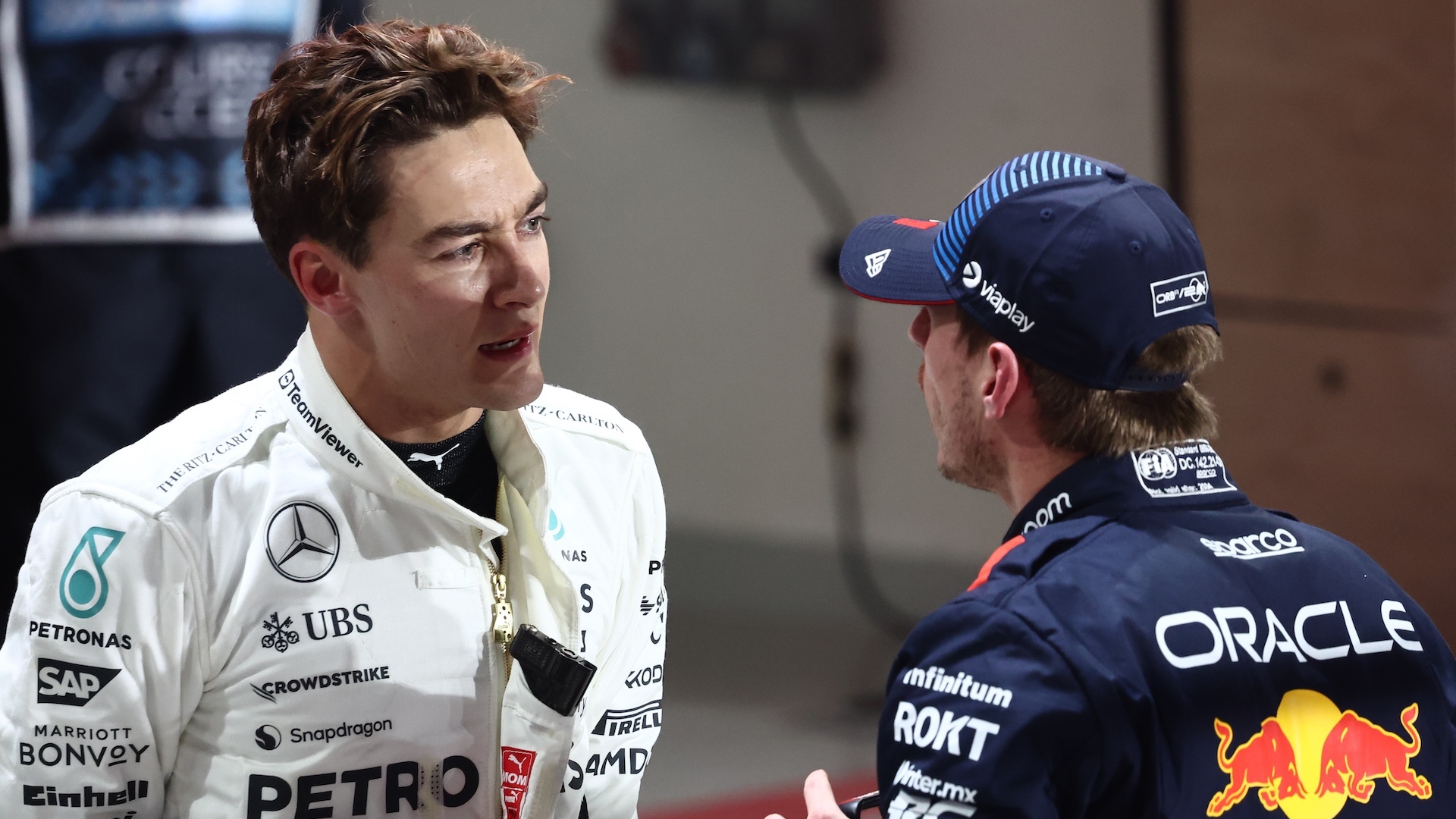 George Russell of Mercedes and Max Verstappen of Red Bull Racing after qualifying ahead of the Formula 1 Grand Prix of Qatar at Lusail International Circuit in Lusail, Qatar on November 30, 2024. (Photo by Jakub Porzycki/NurPhoto)