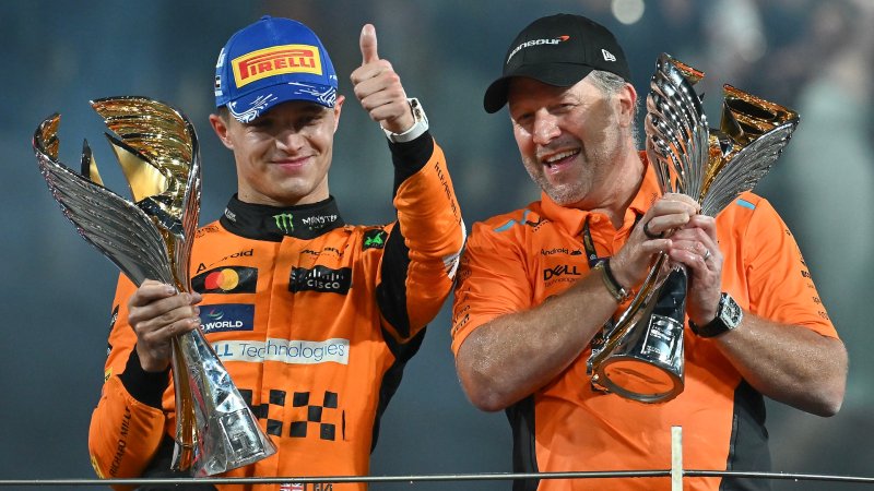 ABU DHABI, UNITED ARAB EMIRATES - DECEMBER 8: Lando Norris of Great Britain and McLaren F1 Team and Zak Brown of USA and McLaren F1 Team celebrate on the podium during the F1 Grand Prix of Abu Dhabi at Yas Marina Circuit on December 8, 2024 in Abu Dhabi, United Arab Emirates. (Photo by Vince Mignott/MB Media/Getty Images)