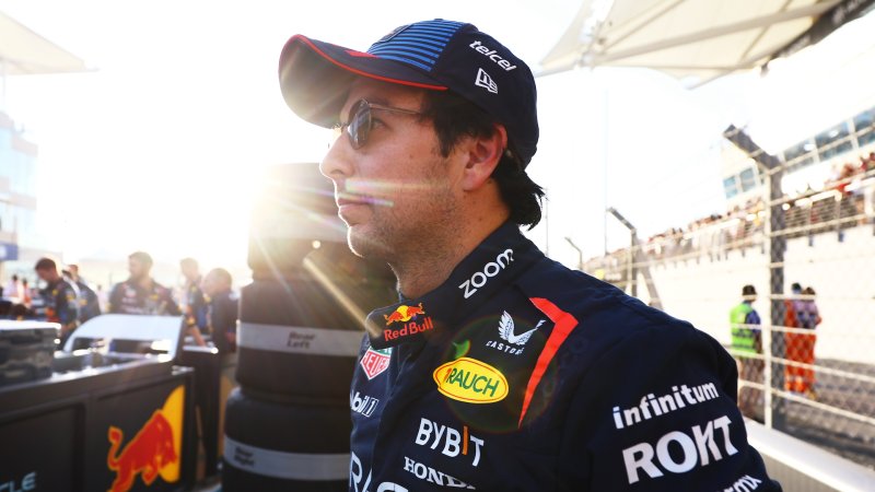 ABU DHABI, UNITED ARAB EMIRATES - DECEMBER 08: Sergio Perez of Mexico and Oracle Red Bull Racing prepares to drive on the grid prior to the F1 Grand Prix of Abu Dhabi at Yas Marina Circuit on December 08, 2024 in Abu Dhabi, United Arab Emirates. (Photo by Mark Thompson/Getty Images)