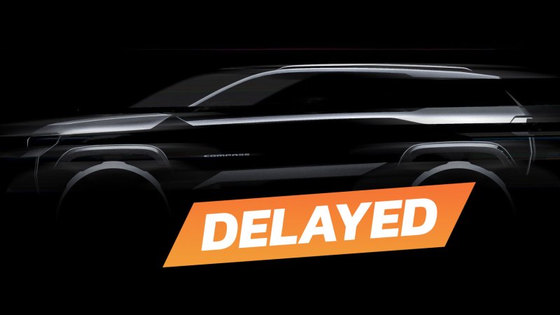 Next-gen Jeep Compass design silhouette with the word "Delayed" superimposed