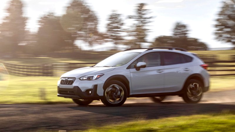 2021 Subaru Crosstrek on dirt road driving.