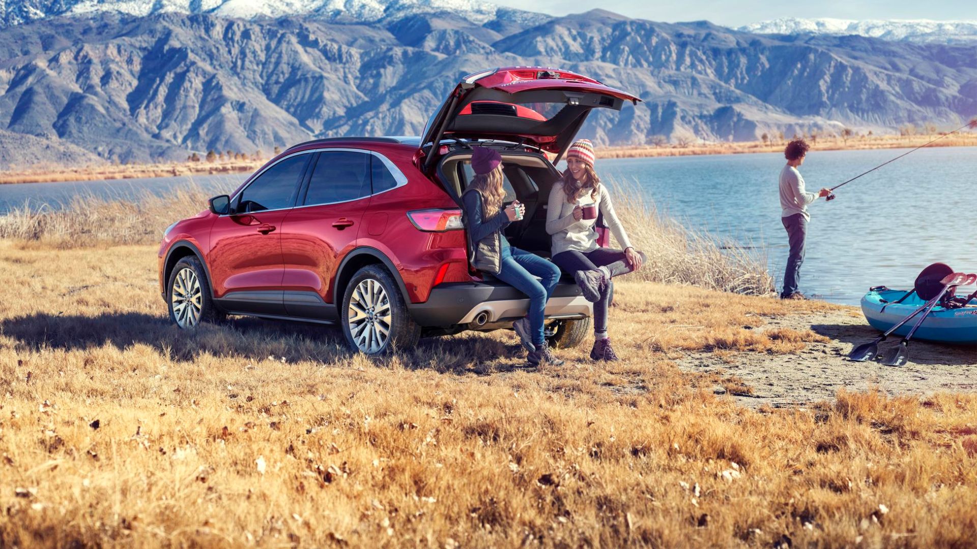 A small encampment with a new Ford Escape.