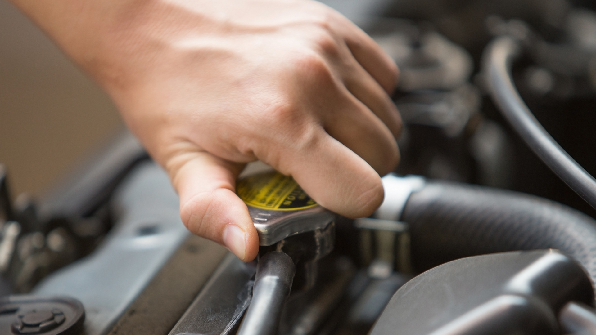 Never grab a hot radiator cap.