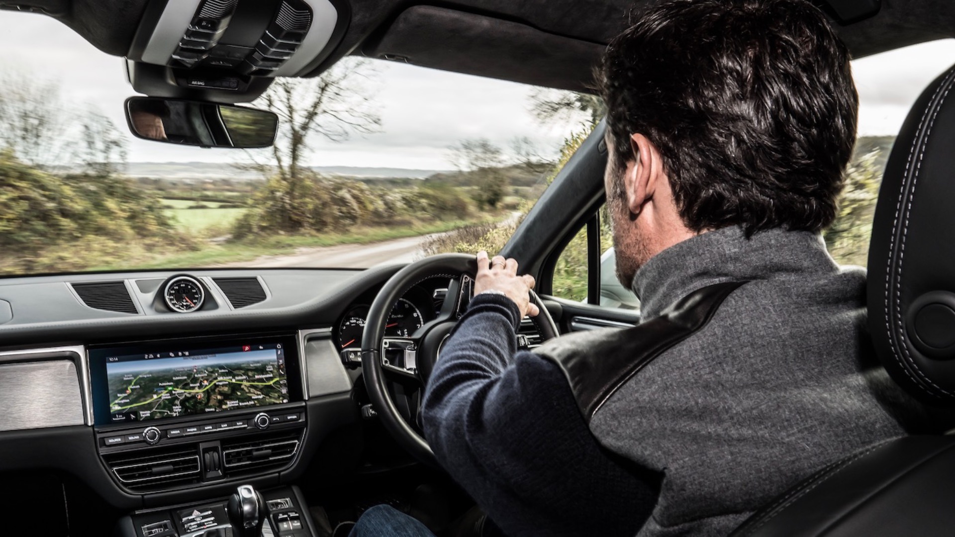 THE Mark Webber showing off the Porsche Macan's electro-hydraulic system. 