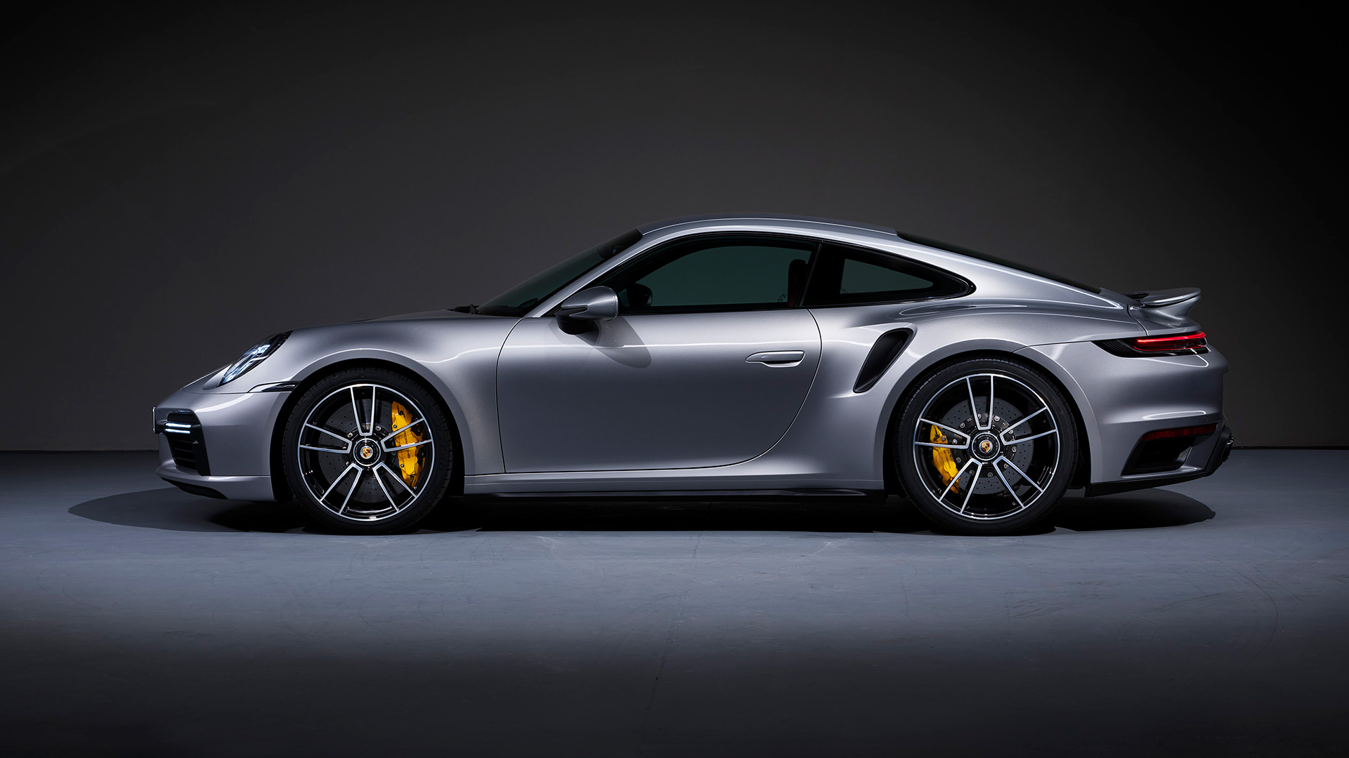 A Porsche 911 Turbo in a photo studio.