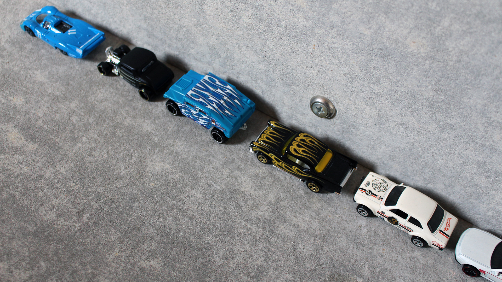 A demonstration of parallel parking using Hot Wheels cars.