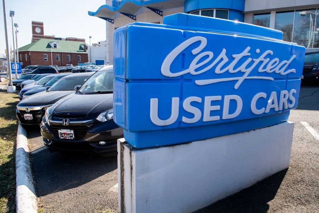 A Honda dealership. The blue color that dominates the aesthetic of any Honda dealer these days is very soft, but not particularly light or pale. One could say it conveys a feeling of friendliness.