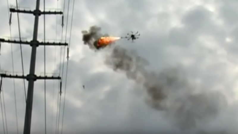 Watch China’s Flying Flame Thrower Drone Burn Trash Off Power Lines