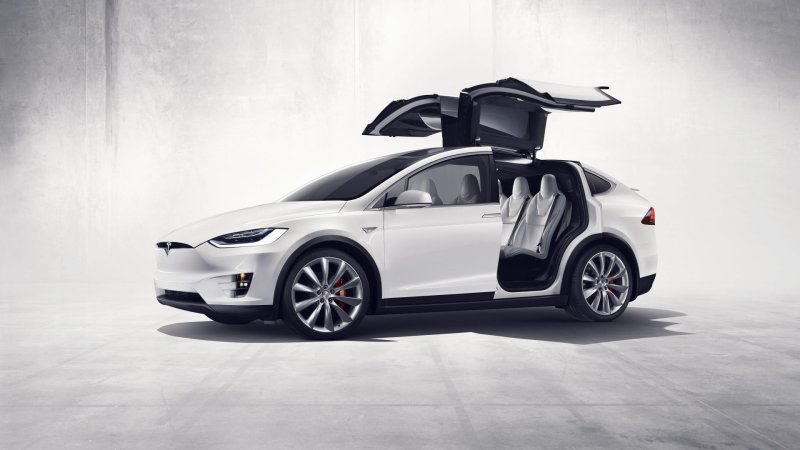 Watch This Truck Take a Tesla Model X’s Door Off