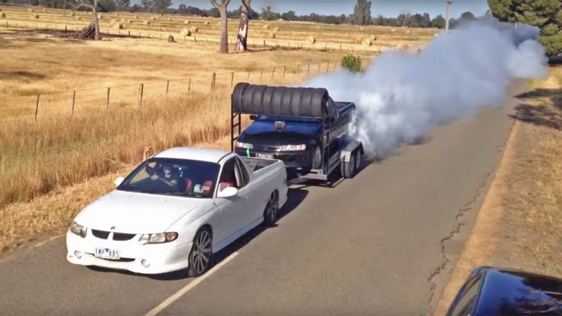 Australian Ute Does a Burnout On a Trailer Towed by Another Ute