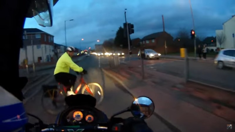 Watch This Biker and Cyclist Collide in an Intersection