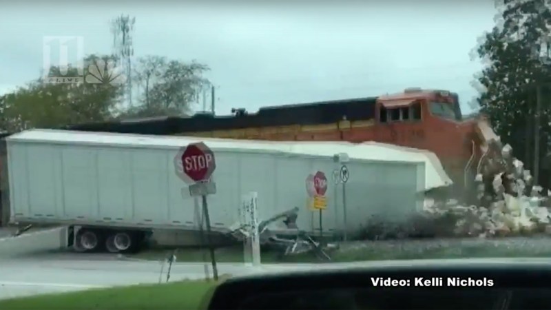 Watch a Freight Train Slam Into a Tractor-Trailer Filled With Candy