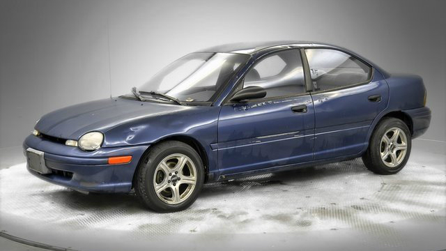 Dealership Gives Beaten-Up $800 Dodge Neon the Full Supercar Photo Shoot Treatment