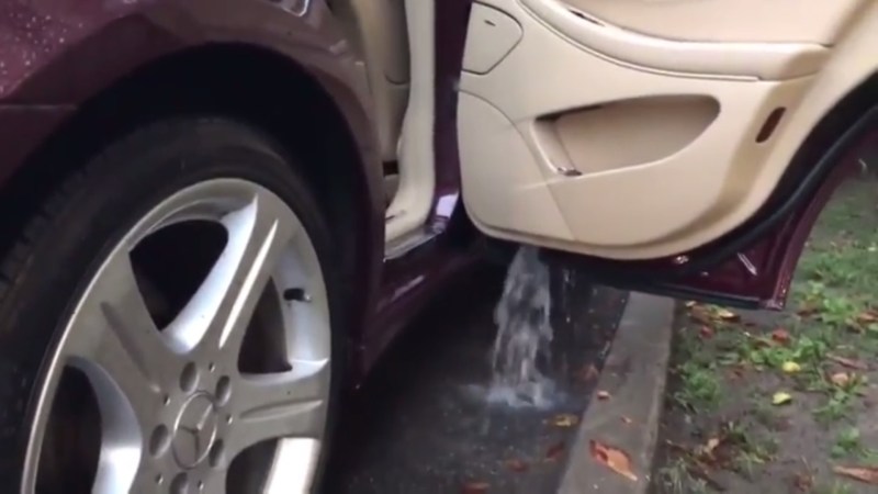 Watch a Waterfall Emerge From This Mercedes-Benz CLS Door Thanks to a Stuck Drain