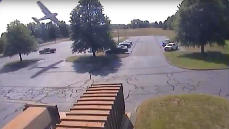 Watch This Airplane Crash Into a Tree and Flop Into a Parking Lot