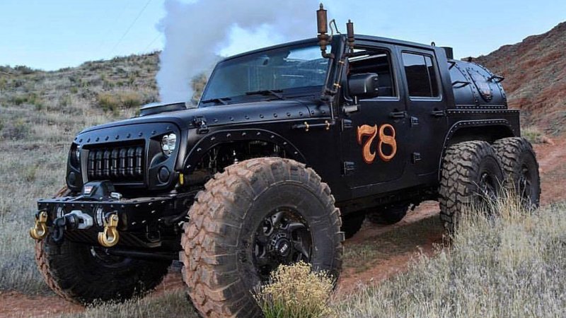 This Jeep Wrangler Has Six Wheels and a Steam Engine