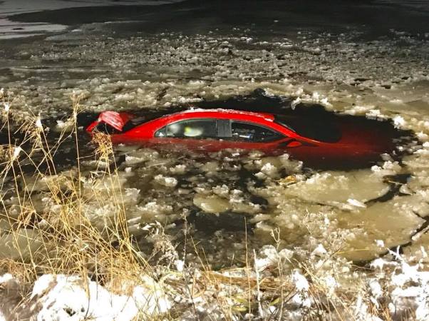 Man Rescued From His Sinking Car on a Frozen Pond by Hero First Responders