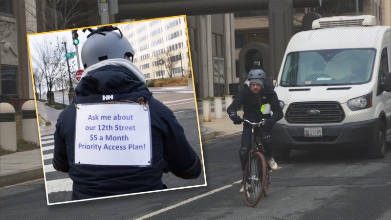 Net Neutrality Protester ‘Throttles’ Traffic on Road Outside FCC Headquarters in Washington D.C.