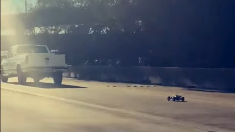 RC Car Spotted Chasing Pickup Truck Down Highway in a Real-Life Toy Story