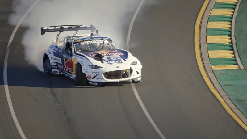 Mad Mike Whiddett Drifts Formula 1 Driver Daniel Ricciardo Around the Melbourne Grand Prix Circuit