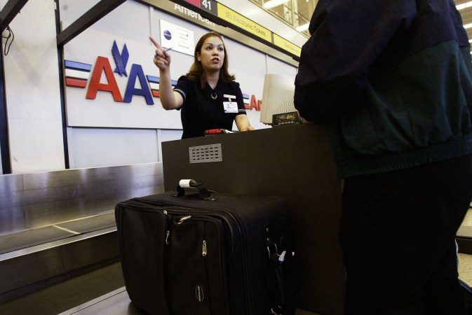 Years after US Airways Merger, American Airlines Plans Manager Layoffs and Buyouts