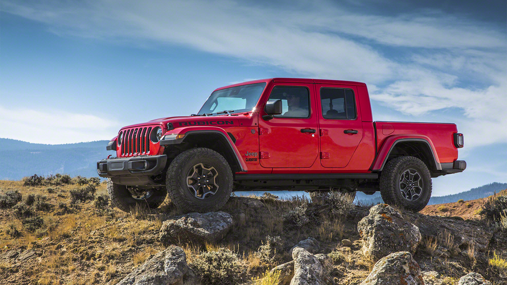 Jeep Gladiator in red.