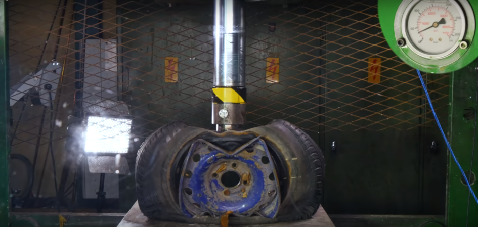 Watching Steel and Alloy Car Wheels Being Crushed by Hydraulic Press Is Weirdly Relaxing