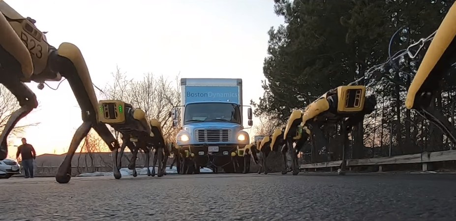 Watch This Pack of Headless Robotic Dogs Pull a Loaded Semi Truck Across a Parking Lot