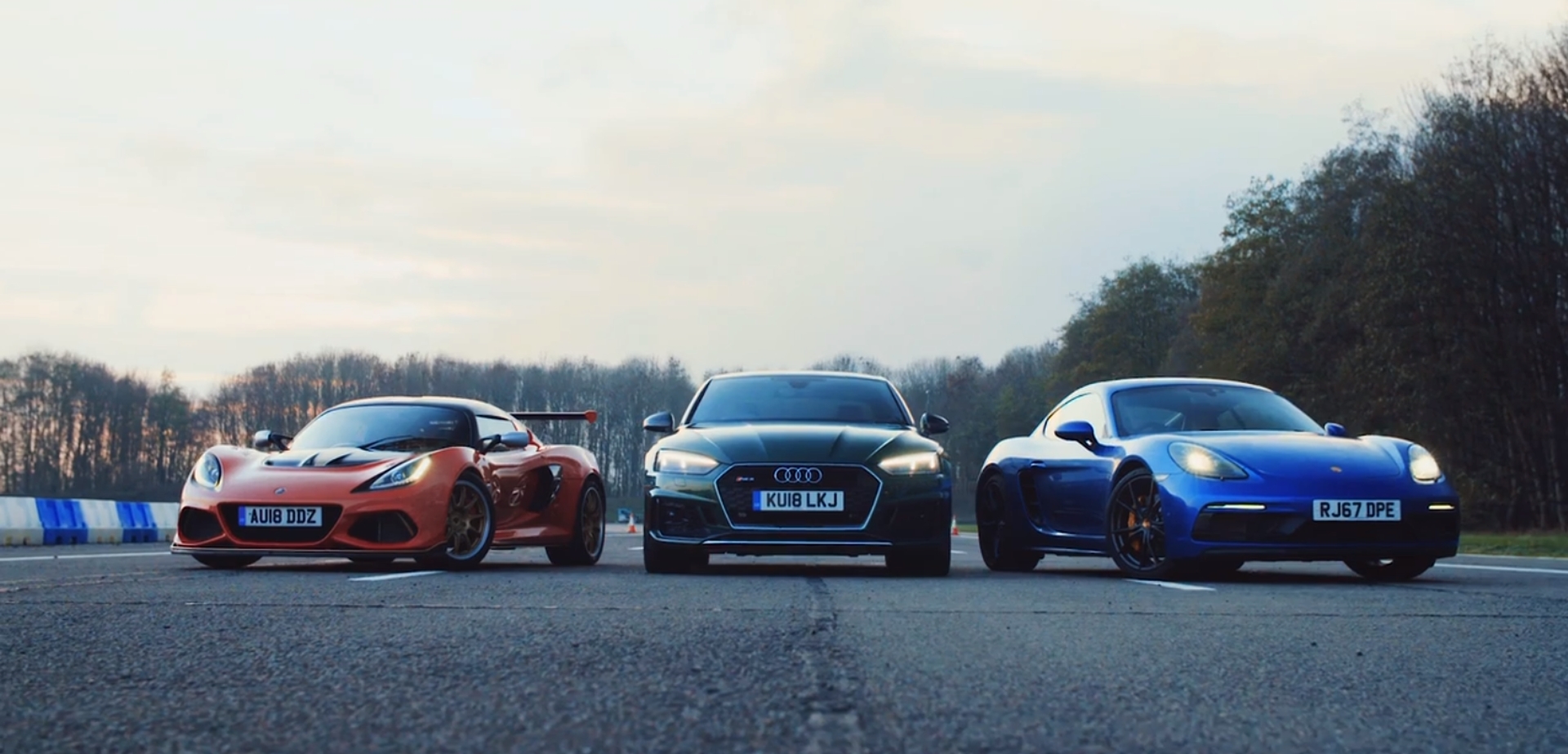 Audi RS5 Drag Races Porsche Cayman GTS and Lotus Exige Cup 430—Who Wins?