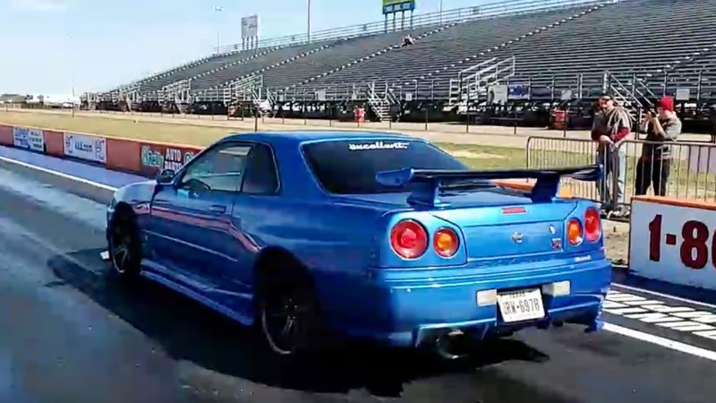 Watch a RWD-Converted Nissan R34 Skyline GT-R Eat the Wall on a Drag Strip